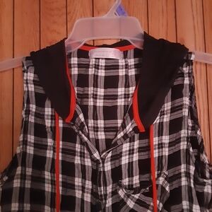 No Boundaries black and white plaid shirt with hood on a hanger